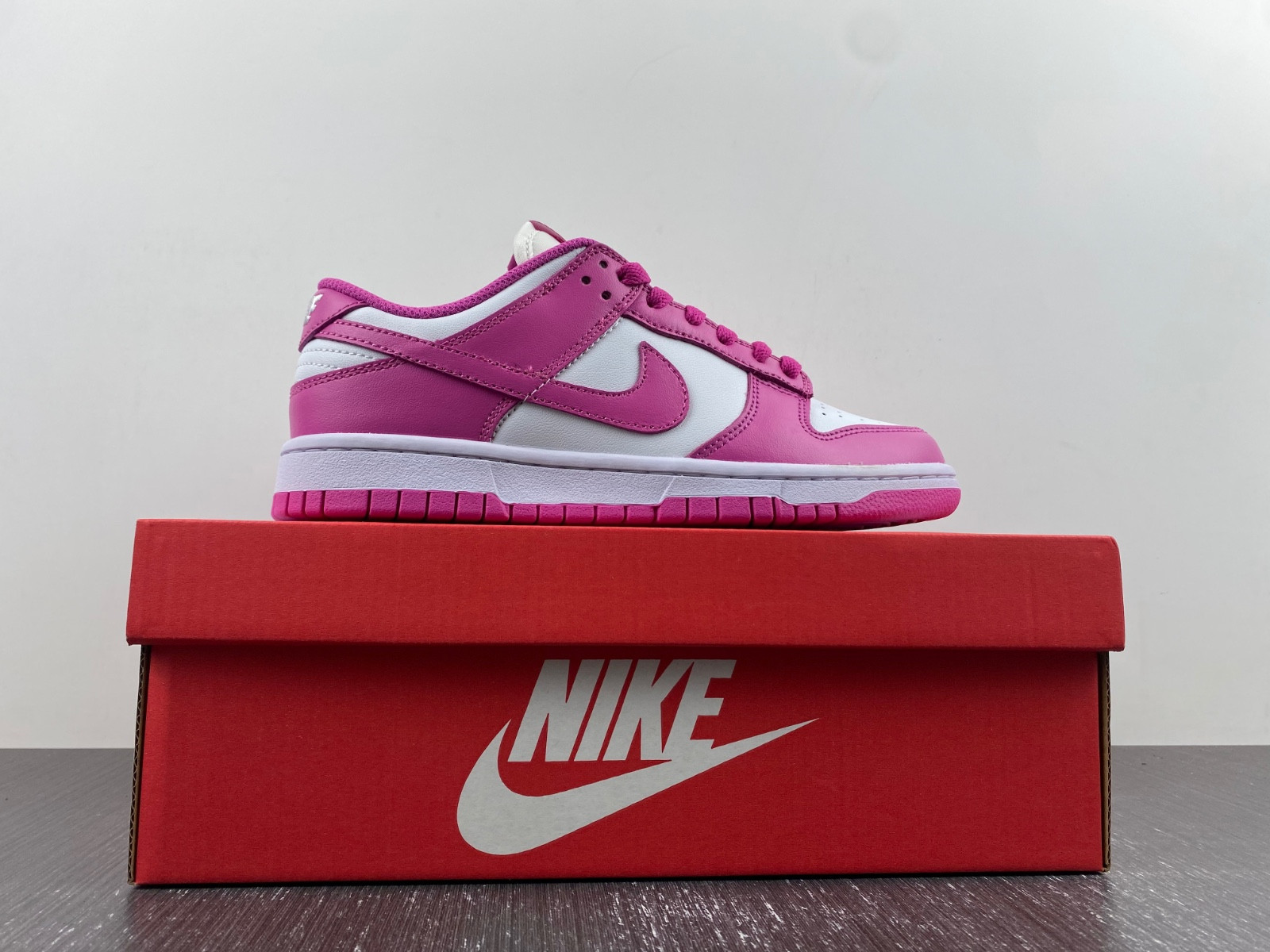 nike dunk low gs “active fuchsia” fj0704-100